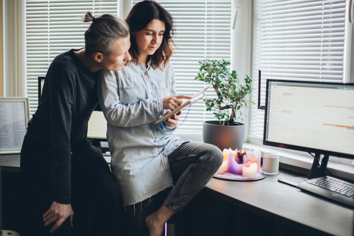 Couple at desk with computer declined a mortgage