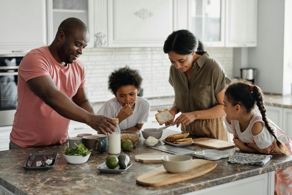 Family in kitchen discussing whether they should change the term of their mortgage